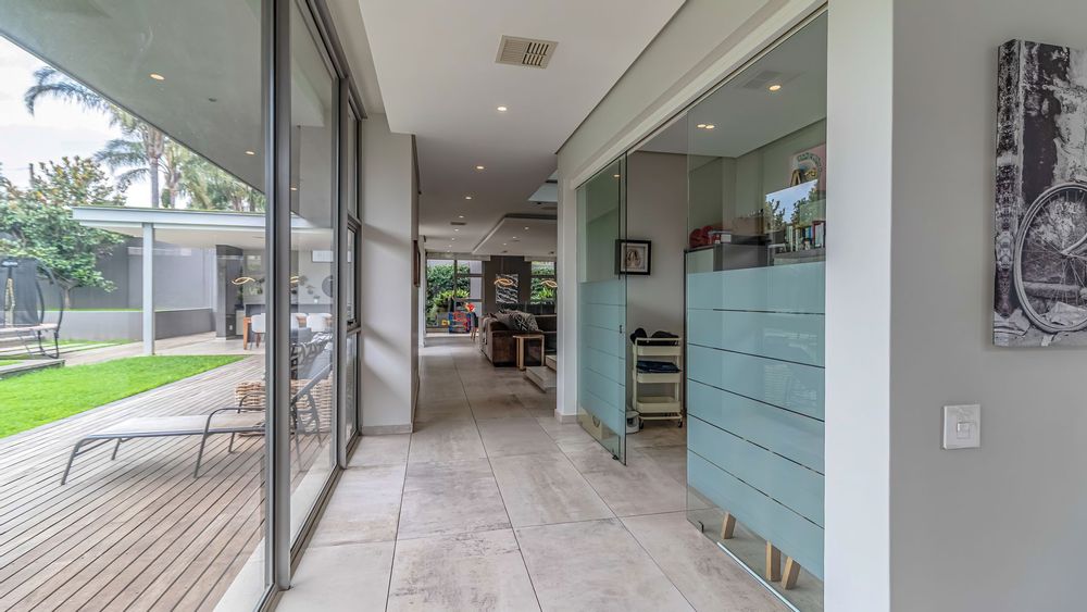 Floor to ceiling glass doors onto the garden