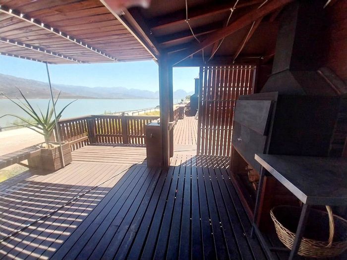 Worcester Rural House For Sale: Waterfront cabin with deck, built-in braai, Yacht Club access.