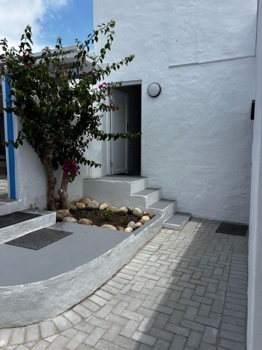 Cottage To Rent in Plettenberg Bay Central with pool, patio, and parking.