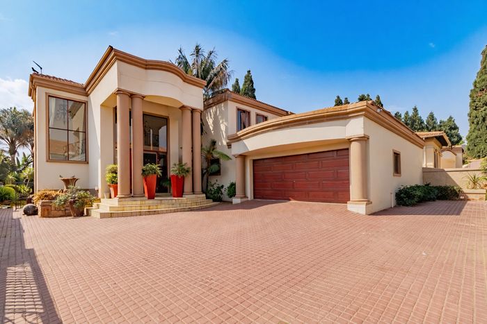 For Sale: House in Blue Valley Golf Estate with golf course access and pool.