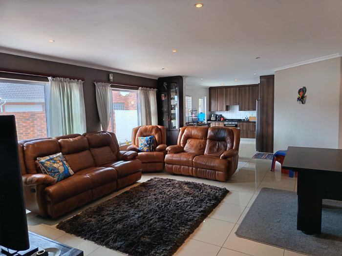 Spacious Summerstrand townhouse for sale with braai area, study, and secure parking.