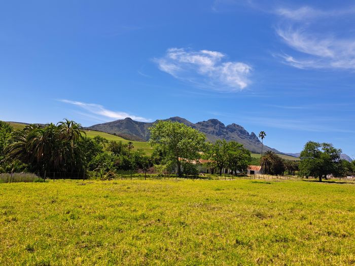 For Sale: 12ha Farm in Stellenbosch Farms with historic building, river, and development potential.