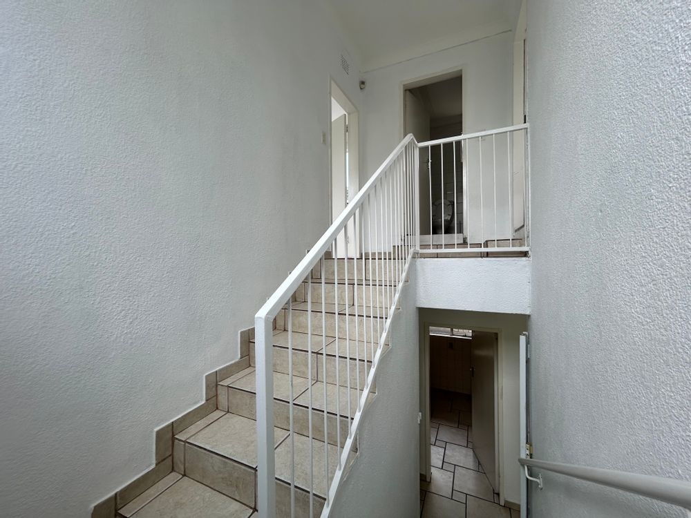 Stairs leading to upstairs bedrooms