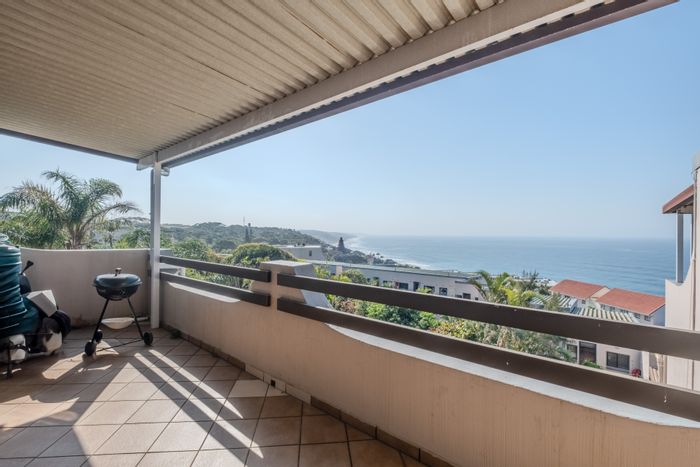 For Sale: Apartment in Newsel Beach with pools, braai area, and 24-hour security.