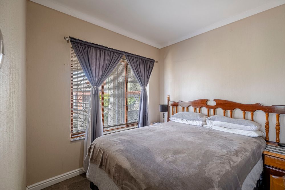 3rd Bedroom on opposite side of the house offering its own lounge and bathroom