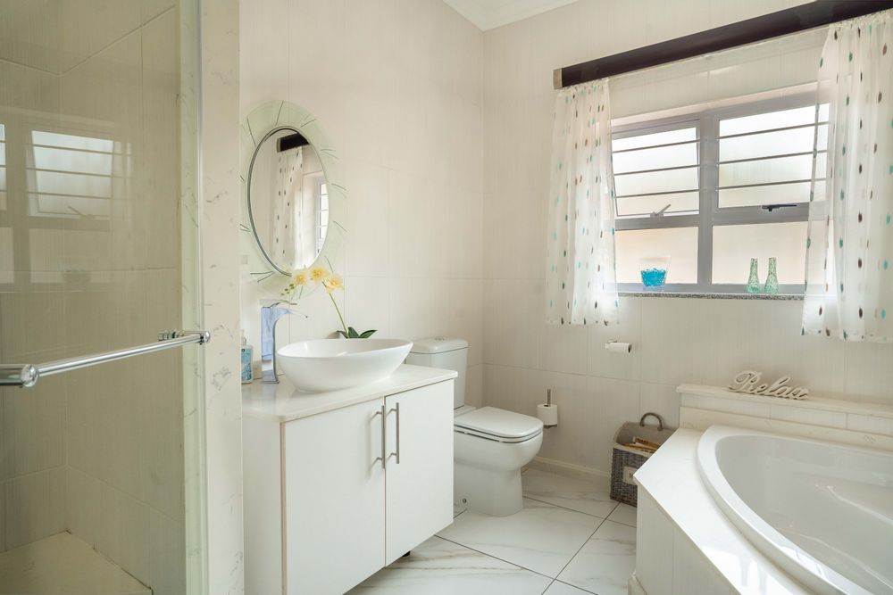 Full bathroom, separate toilet next door