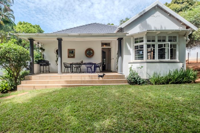 Historic house for sale in Durban North Central, featuring pool, bar, and schools nearby.