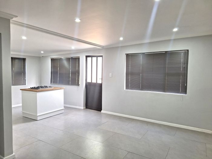 Flat To Rent in Retief: 1 Bedroom, open-plan living, parking included.