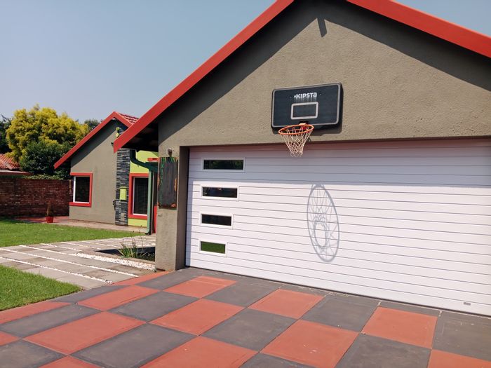 For Sale: Spacious 4-bedroom house in Brackendowns with pool and braai area.