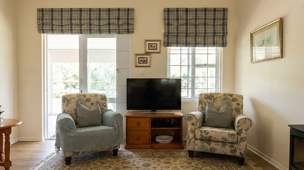 Light and airy living room leads out onto the extensive enclosed veranda.