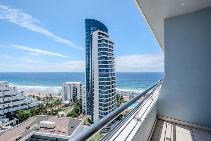Umhlanga Central Apartment For Sale: Sea views, pool access, secure living, ideal investment.