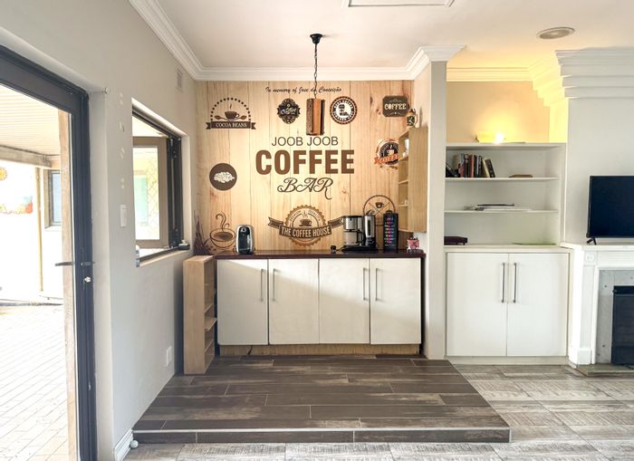 House for Sale in Scottburgh South: 4 beds, sea views, pool, renovation potential.