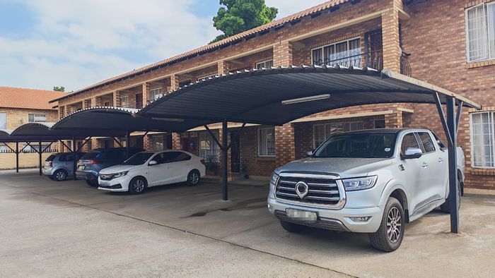 2-Bedroom Apartment For Sale in Rustenburg Central with covered parking and great location.