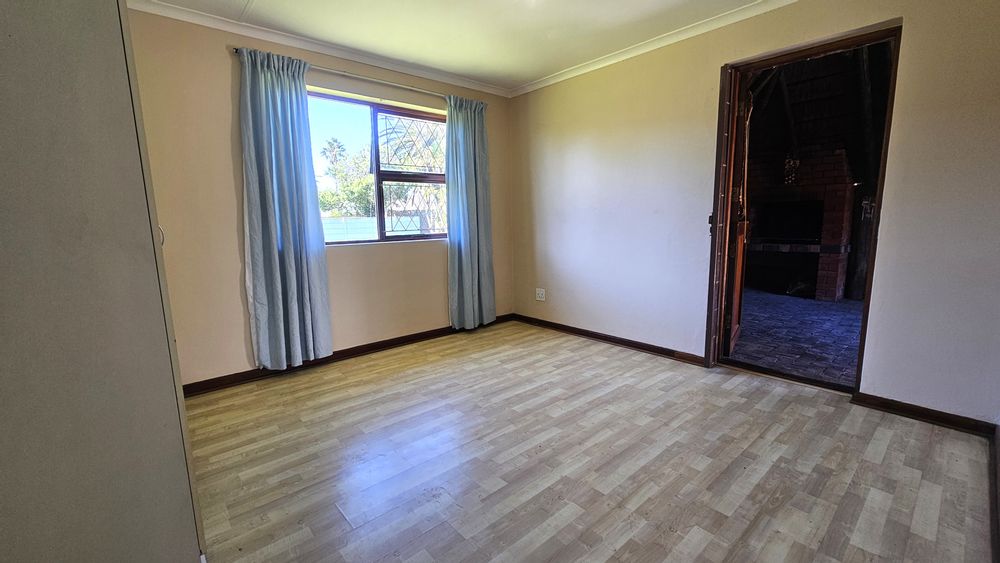 Bedroom leading to undercover entertainment area