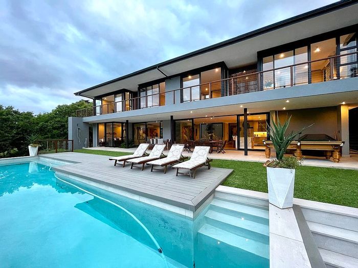 For Sale: House in Simbithi Eco Estate with pool, garden, and triple garage.