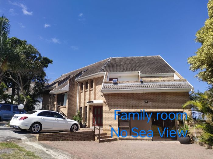 Cove Rock Guest House To Rent: Furnished family room, communal pool, secure parking.