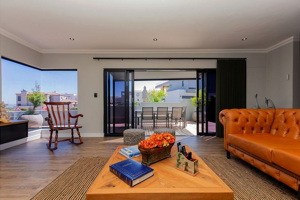 Lovely flow to the covered patio with sea views