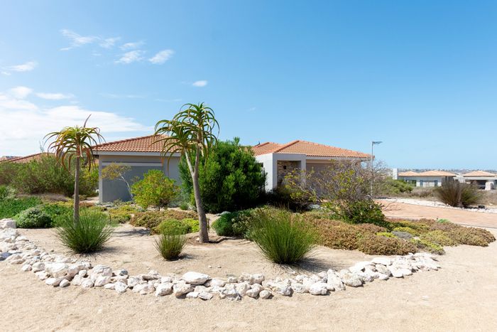 Langebaan Country Estate house for sale: 3 beds, golf course views, secure living.