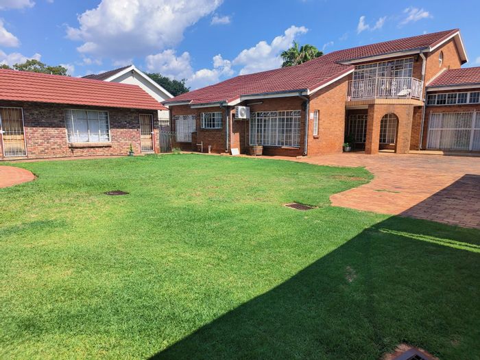 For Sale: Potchefstroom Central House with 11 bedrooms, 5 flats, pool, and boreholes.