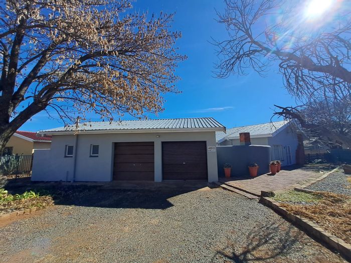 For Sale: Arbor View House with pool, outbuilding, and spacious backyard.