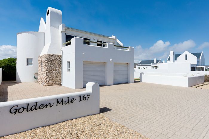 For Sale: House on Golden Mile with beach access, flexible design, and ocean views.