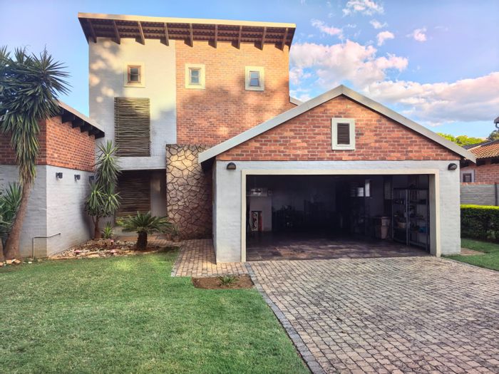 For Sale: House in Waterval East with pool, double garage, and spacious layout.