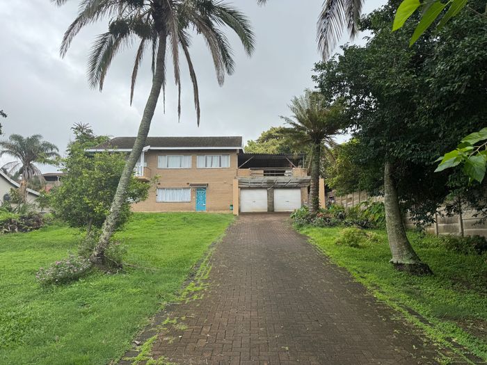 House For Sale in Scottburgh South: Ocean views, pool, solar, and spacious living.