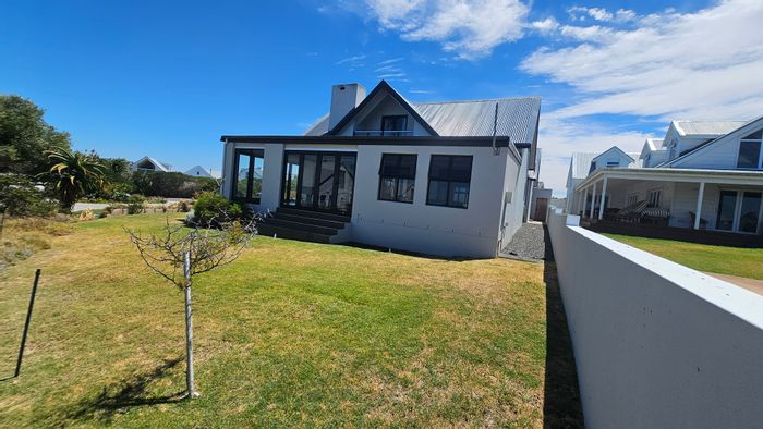 For Sale: Grotto Bay House with B&B potential, private beach access, and nature reserve.