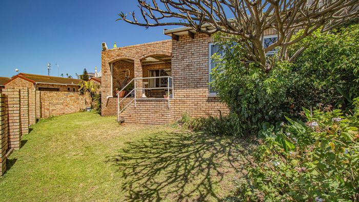 For Sale: Townhouse in South End with pool, garage, and enclosed garden.