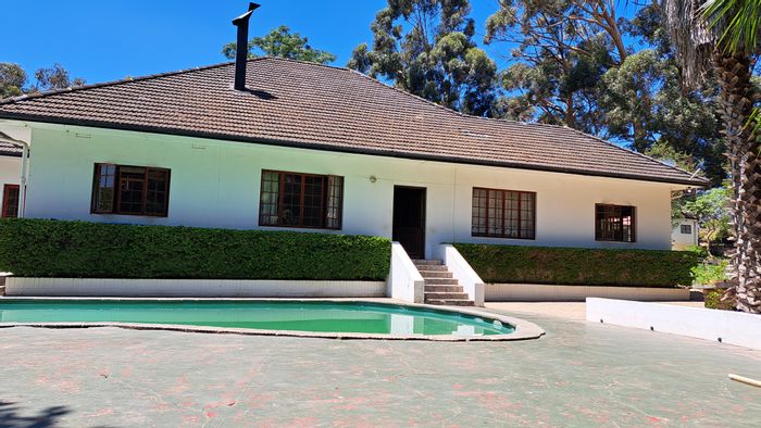 For Sale: 13.5 ha farm in Paarl Rural with main house, hall, and outbuildings.