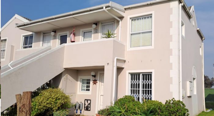 For Sale: Apartment in Pinelands with pool access and mountain views.