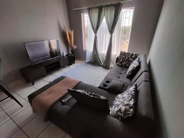 2-Bedroom Apartment For Sale in Pretoria North with secure complex and garden.