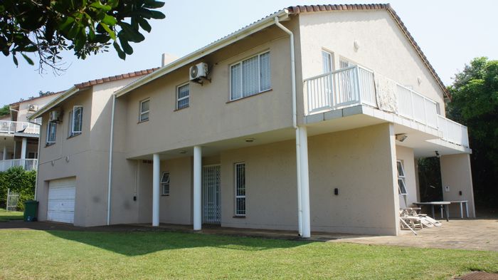 Bazley Beach Townhouse For Sale: Pool, beach access, spacious grounds, and security features.