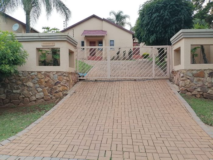 For Sale: Rangeview House with pool, double garage, study, and scenic views.