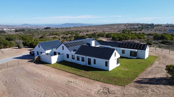For Sale: House in Long Acres Country Estate with off-grid system and horse-friendly land.