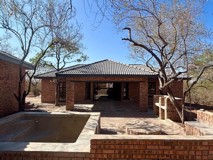 For Sale: House in Marloth Park Central with 3 en-suite bedrooms, pool, and braai.