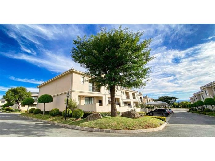 For Sale: Carlswald Townhouse with 3 bedrooms, garden, and covered parking.
