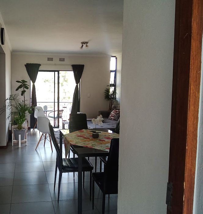 For Sale: Zandspruit Apartment with 2 bedrooms, balcony, and secure parking.