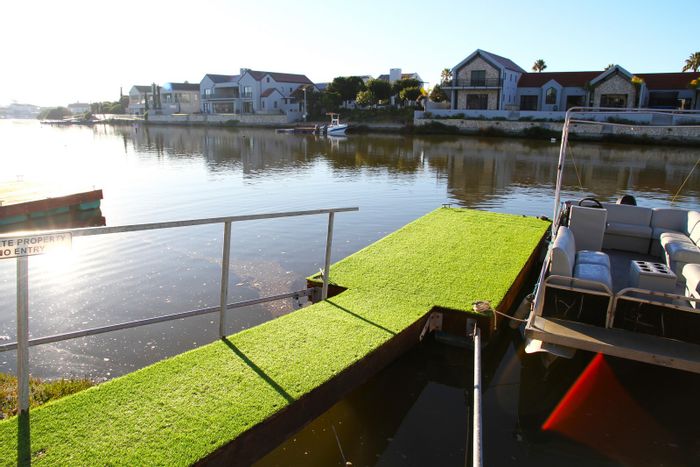 For Sale: House in Port Owen with 5 bedrooms, private jetty, and canal access.