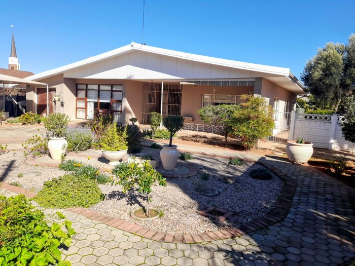 For Sale: House in West Bank with 3 beds, flat, parking, and garden.