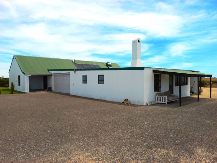 For Sale: Velddrif Central Small Holding with sea views, solar power, and spacious amenities.