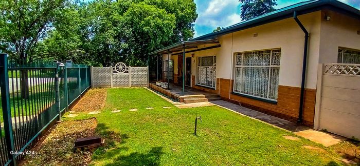For Sale: Spacious 4-Bedroom House in Hennenman Central with Braai Stoep and Orchard.