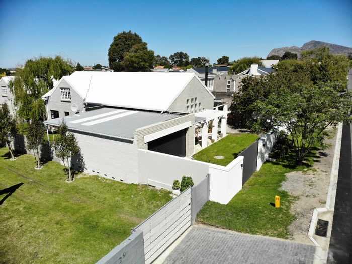 Kleinmond Central House For Sale: Spacious 4-bed home with guest cottage, garden, and security.