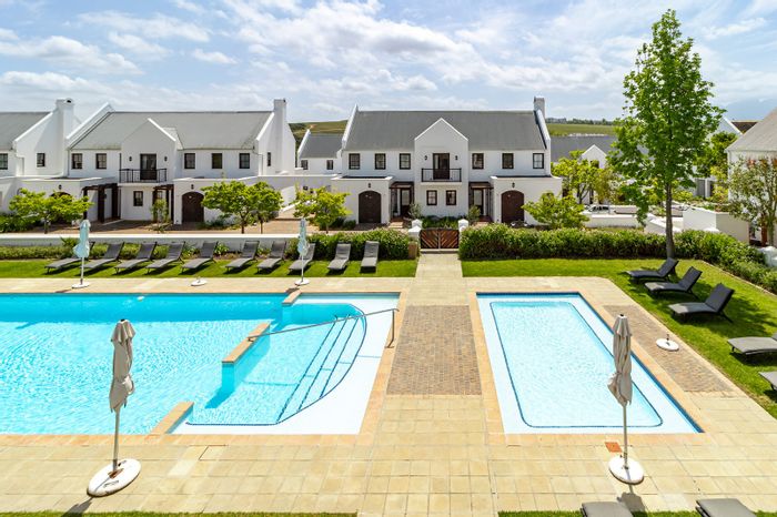 For Sale: 3-bedroom apartment in De Zalze Winelands Golf Estate with golf cart garage.