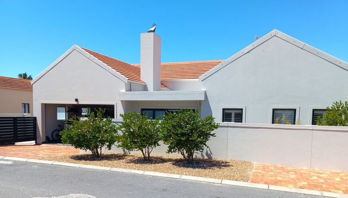 For Sale: House in Port Owen with 2 bedrooms, study, and secure marina access.