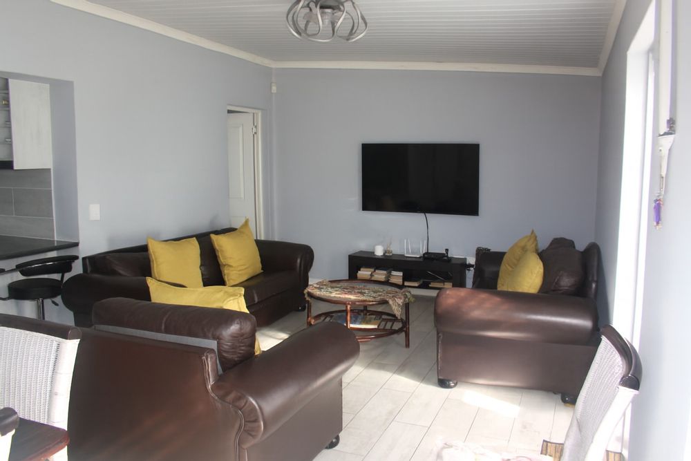 main bedroom leads out of living room