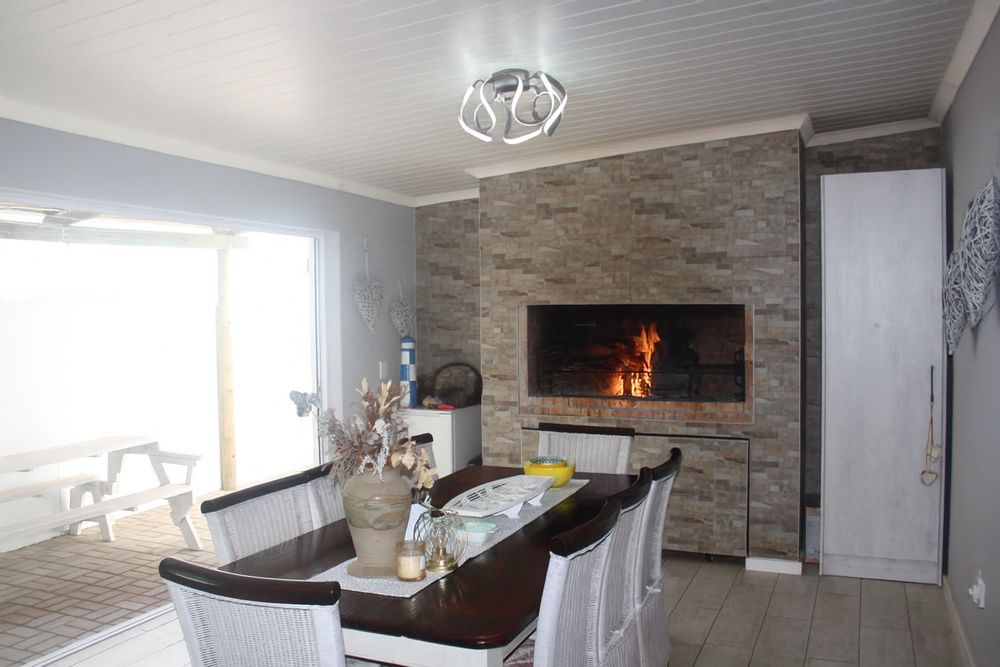 Opens to outdoor patio with stack doors