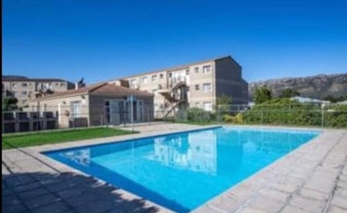 To Rent: Apartment in Somerset West Rural with pool, park, and 24-hour security.