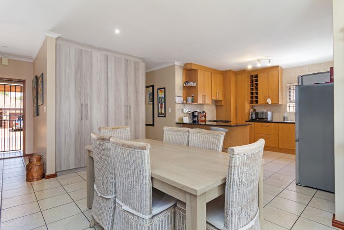 For Sale: House in Brackenfell South with 3 beds, solar panels, and security features.