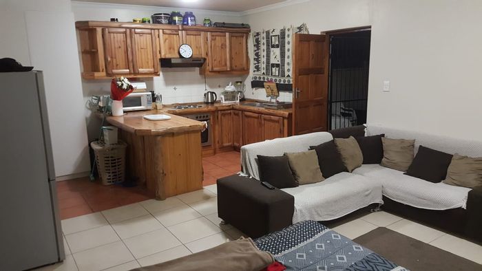 Ground floor apartment in La Colline with security, parking, and garden access. To Rent.